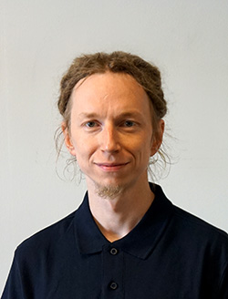 Portrait of Greg Bak, product development manager of Xopero Software