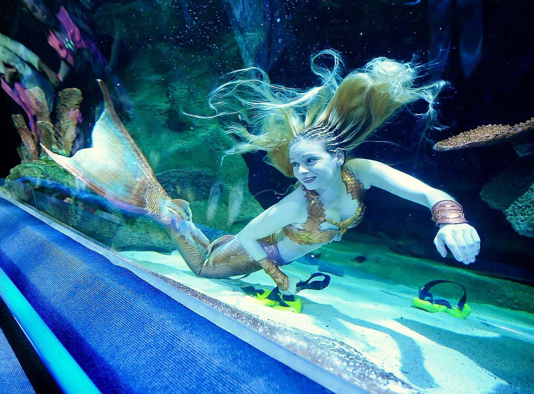 Mermaid appears at Blue Planet Aquarium in Cheshire Oaks, Cheshire, Britain - 20 Oct 2013